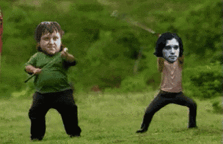 a group of dwarfs are standing in a field with their faces on their shoulders .