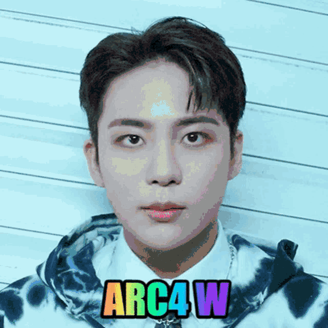 a close up of a person 's face with the name arc4w written above it