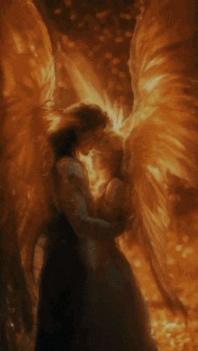 a painting of a woman with wings holding a child .