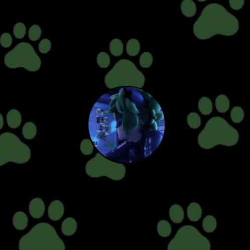 a black background with green paw prints and the words whovian that made gif on it