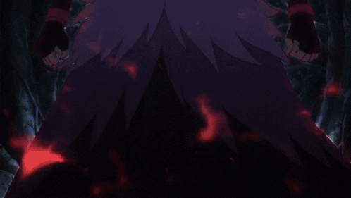 a close up of a person 's face with glowing eyes and teeth