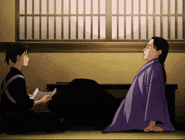 a man in a purple kimono sits next to a woman in a black shirt