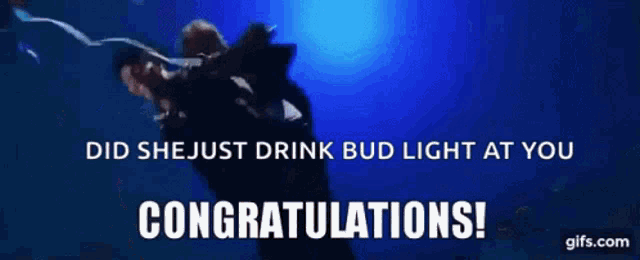 a congratulations gif with a picture of a man and woman