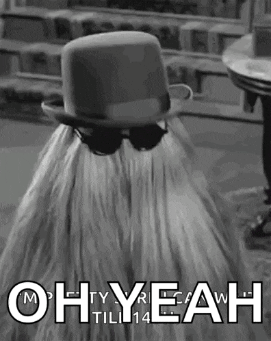 a black and white photo of a person wearing a top hat and saying oh yeah till 14