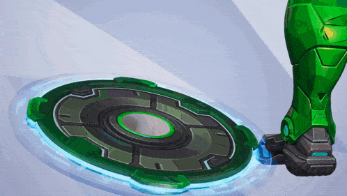 a green robot 's leg is standing on a green circular object