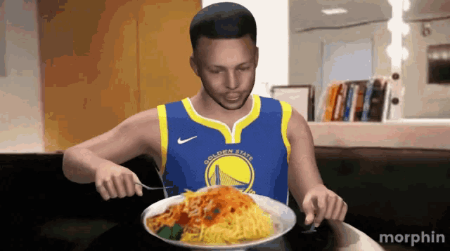 a man in a golden state warriors jersey is eating a plate of spaghetti