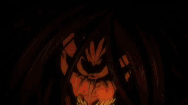 a close up of a person 's face with a fire coming out of it .