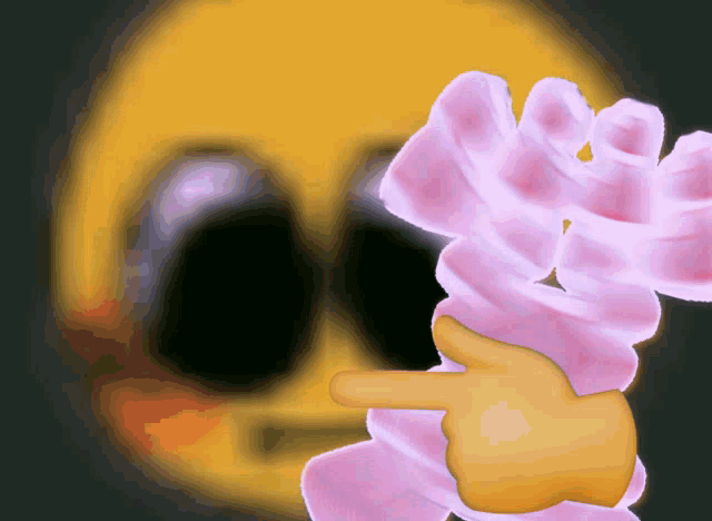 a hand is pointing at something in front of an emoji