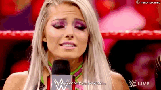 a woman in a wrestling ring is talking into a microphone and saying sincerely apologize .