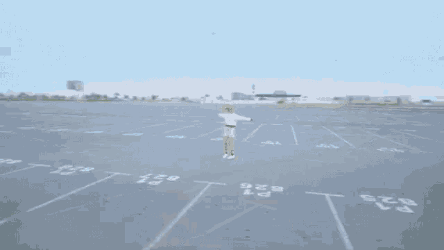 a person is walking through an empty parking lot with the numbers r1 and r25 painted on it