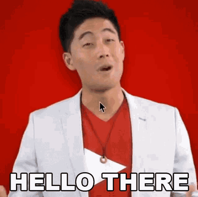 a man in a white suit says hello there