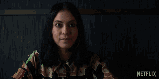 a woman says i 'm directing in front of a netflix ad