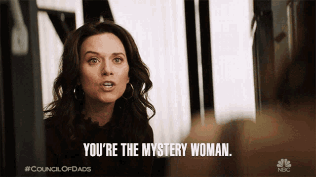 a woman says " you 're the mystery woman " in a council of dads ad