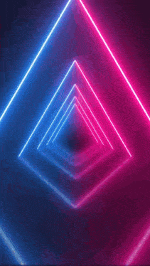 a heart is surrounded by neon lights on a dark background .