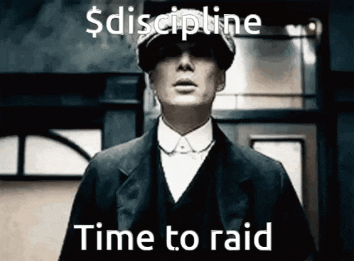 a man in a suit and hat is standing in front of a building and saying `` discipline time to raid '' .