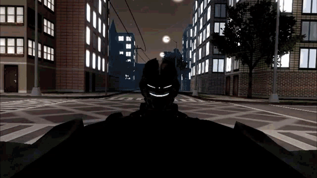 a silhouette of a person with a smile on their face is driving down a street