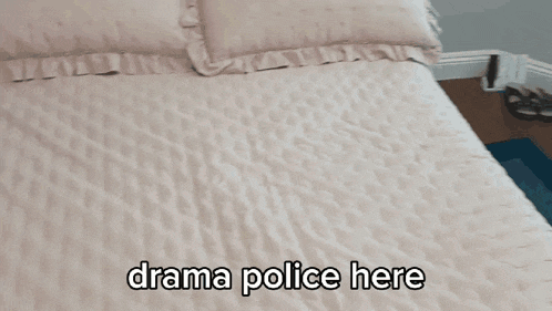 a person holding a stuffed animal with the words " drama police here " above it