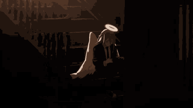 a man with angel wings is sitting on the stairs