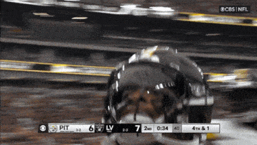 a football game between pittsburgh and the raiders is underway