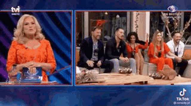 a woman is talking to a group of people sitting on a couch on a television show .