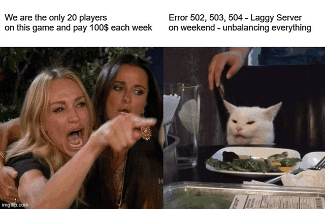 two women are pointing at a cat that is sitting at a table with a plate of food on it .