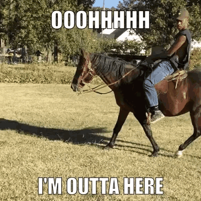 a man riding a horse in a field with the words i 'm outta here below him