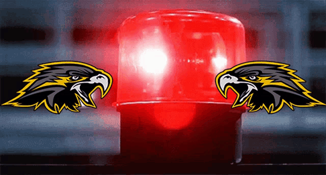 a red light with a black and yellow eagle on it