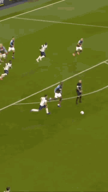 a blurry picture of a soccer player with the number 5 on his shirt