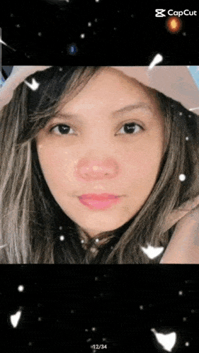 a close up of a woman 's face with a capcut watermark