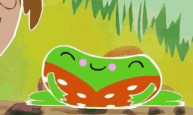 a green and orange frog with white polka dots is hugging someone