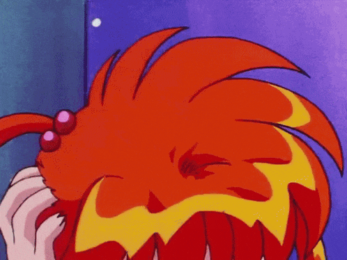 a close up of a cartoon character with red hair