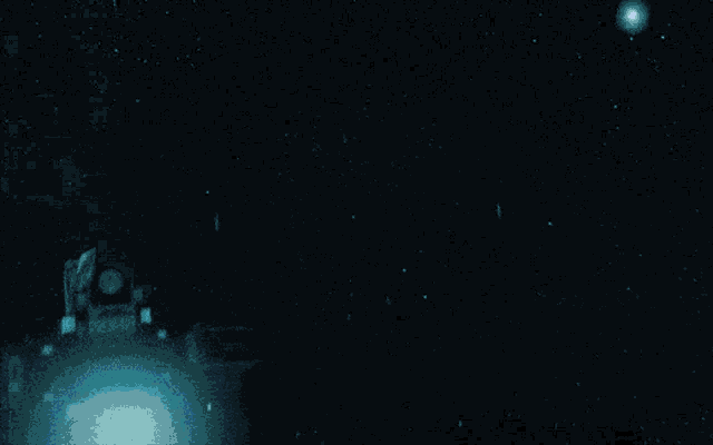 a blue light is shining on a black object