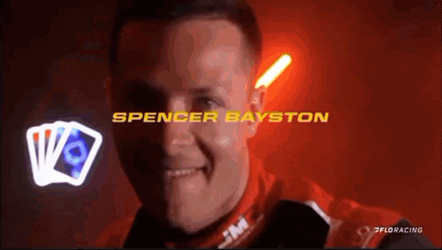 a close up of a man with the name spencer bayston on the bottom