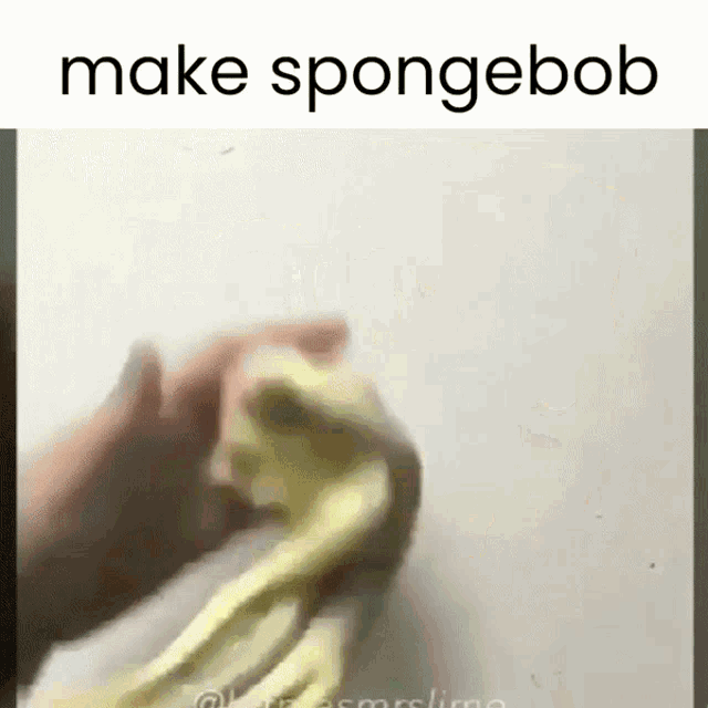 a person is holding a piece of yellow slime in their hands .