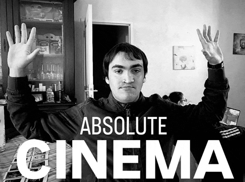 a black and white photo of a man with his hands in the air and the words absolute cinema behind him