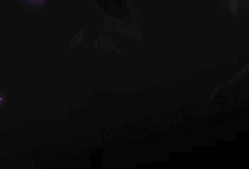 a person is standing in front of a purple and black background .