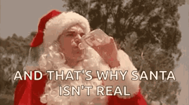 a man in a santa claus costume is drinking from a bottle .