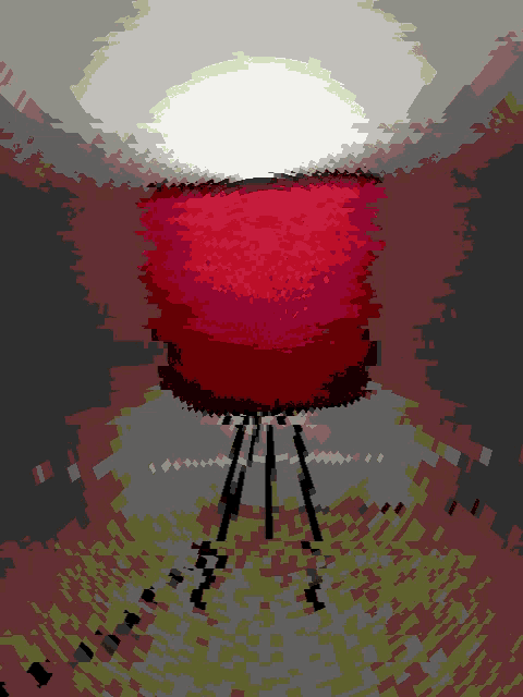 a pixelated image of a red object with a white circle in the middle