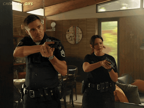 a couple of police officers standing in a living room with chenford gifs written above them