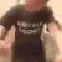 a blurry picture of a person wearing a black shirt
