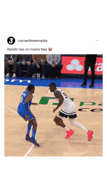two basketball players are playing a game of basketball and one of them has an insane bag .