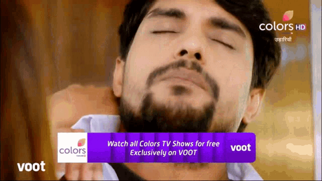 a man with his eyes closed and a purple banner that says colors tv shows for free exclusively on voot