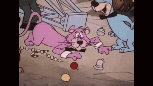 a pink panther and a blue dog are playing with each other on the ground .