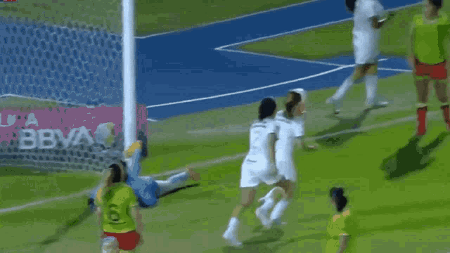 a group of female soccer players wearing pumas en la df uniforms