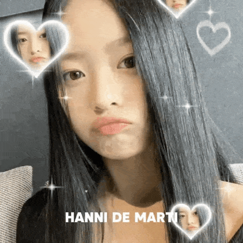 a girl with long black hair is sitting on a couch with hearts around her face and the name hanni de martin on the bottom .