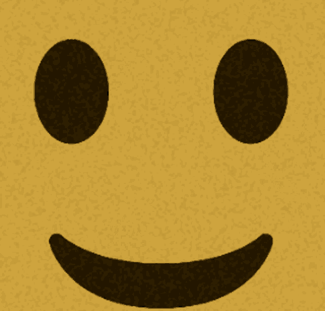 a yellow background with a smiley face and two black circles on it
