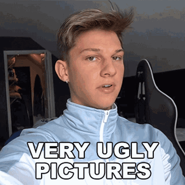 a young man taking a selfie with the words very ugly pictures above him