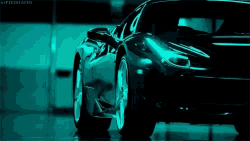 a black sports car is parked in a parking garage with the words speedhaven written on the bottom