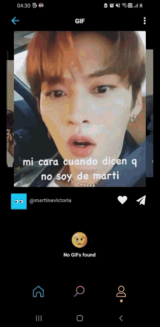 a phone screen shows a gif of a man 's face and the words " no gifs found "
