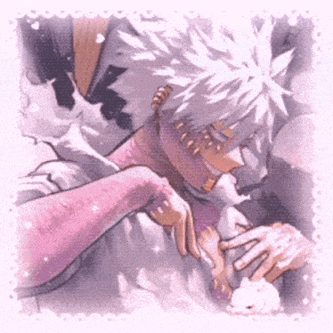 a close up of a person 's hand on another person 's shoulder